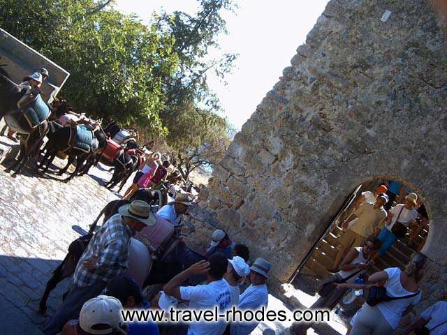 WALKING OR RIDING - In order to climb to Lindos Acropolis you can choose between walking and taking a ride with a donkey