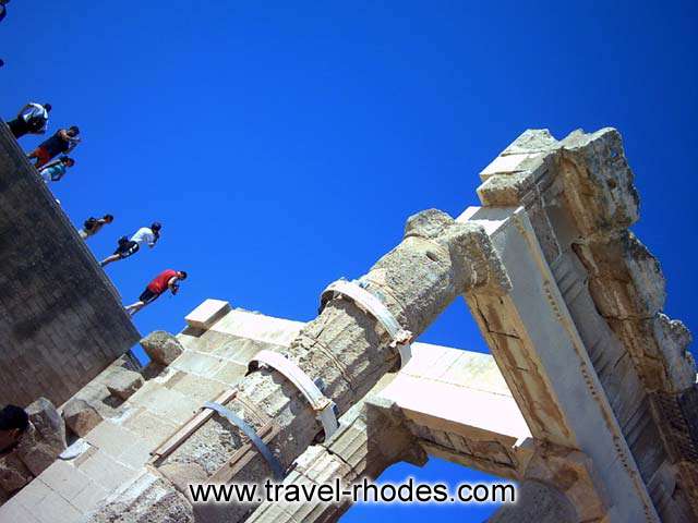 LINDOS ACROPOLIS - Tourists taking pictures in Lindos Acropolis