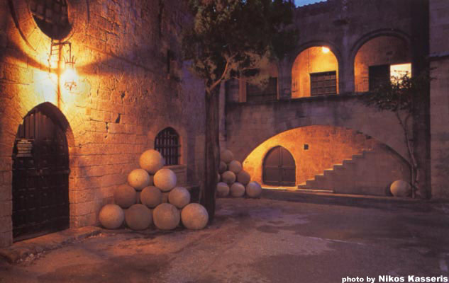 OLD TOWN - You feel that you are living in the troubled past of this place, but at the same time you discover that this city, still inhabited, with its lively commercial activity, the Archaeological Museum, the Art Gallery, the Museum of Folk Art, and its night lif by Nikos Kasseris